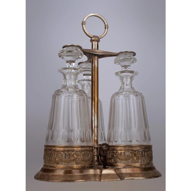 Jugendstil/Art Nouveau Set of Silver Tantalus and Three Glass Decanters with Stoppers by german company Württembergische...