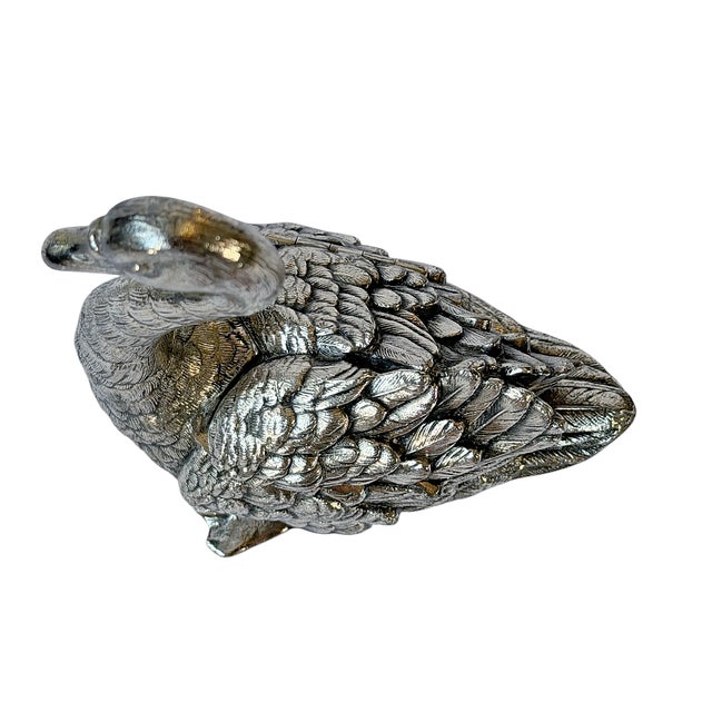 This is a late 19th-century figural swan vessel by the Meriden Britannia Company of Meriden, Connecticut, one of the most...