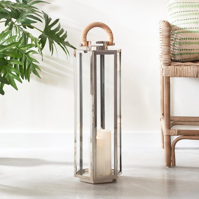 This six panel lantern is made of stainless steel and natural teak handles. Impressive in scale, it is a great accent...