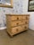 This is a beautiful English pine chest featuring two small drawers over two larger ones. It has medium warm coloring, and...