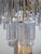 Magnificent cascade chandelier by Venini. Italy, 1960s. Brass frame. It features magnificent Murano glass pendants....