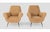 Retro elegance and Italian charm blend perfectly in this beautiful pair of vintage armchairs from the 1950s. The design...