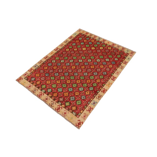 A mesmerizing addition to any decor, this exhilarating hand-knotted rug featuring exquisite coloration in an intricate...