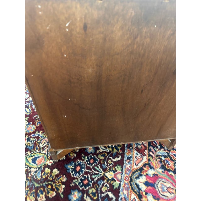 Embrace the elegance of traditional American craftsmanship with our Pennsylvania House Nightstand. This classic piece,...