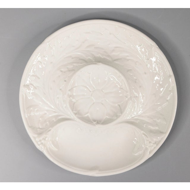 A stunning pair of French Gien white majolica artichoke plates, circa 1940. Maker's mark on reverse. These fine hand...