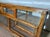 old shop display counter with two sliding doors and three folding doors, completely in solid teak
