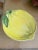 This fun ceramic piece is in the form and painted to look like a giant lemon. From the coast of Italy and stamped on the...