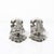 This charming Pair of Victorian American Silver-Plated Figural Napkin Rings originated in the United States, circa 1880....
