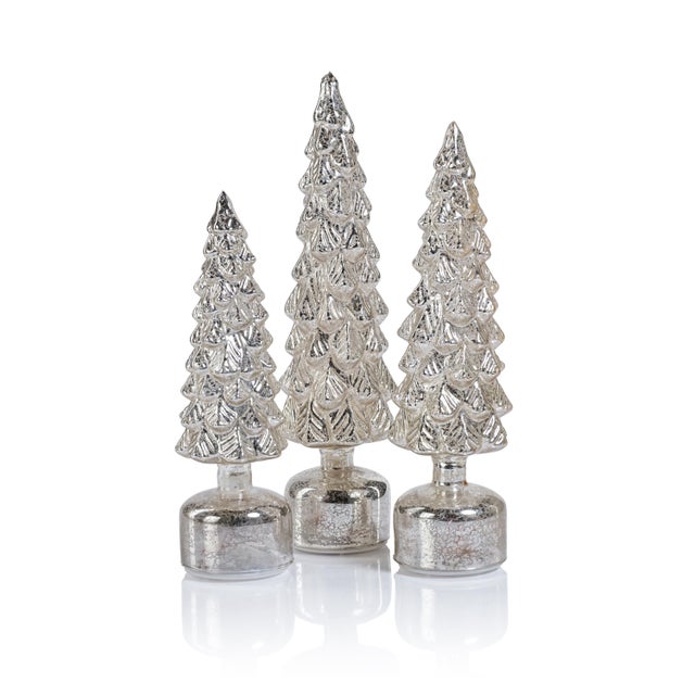 Add a touch of festive charm to your decor with the Mugo Pine Rotating LED Holiday Tabletop Tree. Resembling speckle...