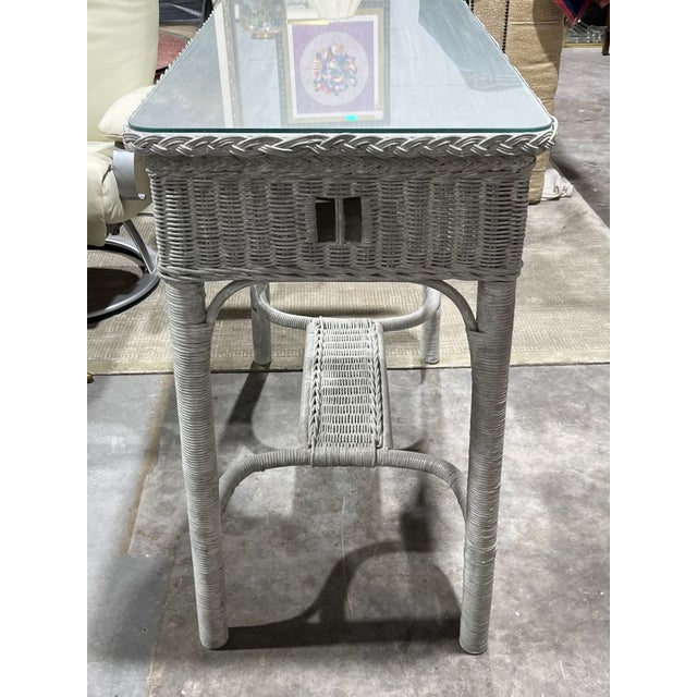 Antique Wicker Console Table or Center Hall Table. The table has "open window" details—two front and back, one on either...