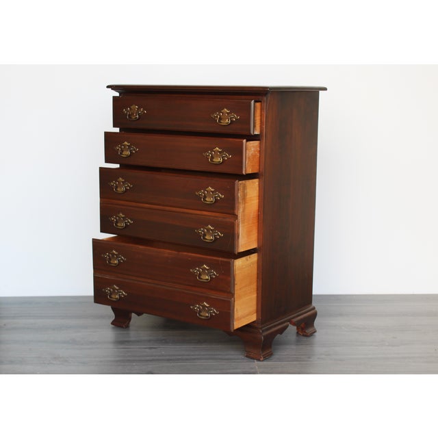 Vintage solid built Chippendale chest of four drawers with dovetail joint and metal hardware This chest has minor wear and...