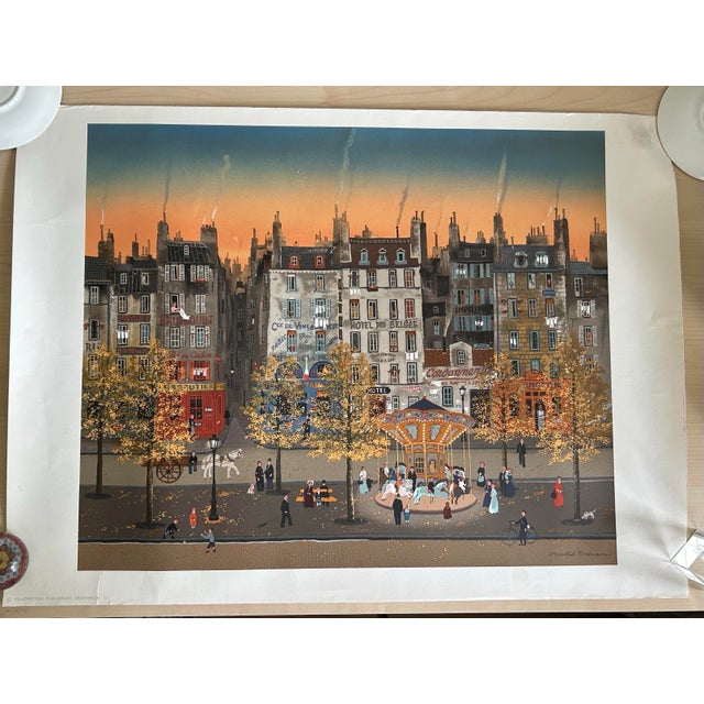 Charming vintage Parisian street scene offset lithograph after Michel Delacroix, depicting a nostalgic evening boulevard...