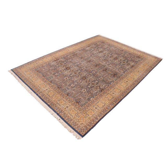 Designed with mesmerizing intricacy and gorgeous color palette, this hand-knotted masterpiece demonstrates the beauty and...