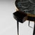 Elegant ebonized side table featuring a brass gallery and a convenient small drawer. Topped with a striking green marble,...