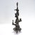 A fine Mid-Century bronze sculpture. In the form of a stylized totem. With a round plinth supported by 3 legs (and thus a...