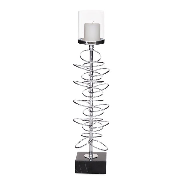 The Large Ring Toss Candle Holder Our Ring Toss Candle Holder features iron rings encircling a central rod. The entire...