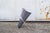 Umbrella stand made of anodized aluminum rod and turned and sheared sheet metal. Designer: Ettore Sottsass Manufacturer:...