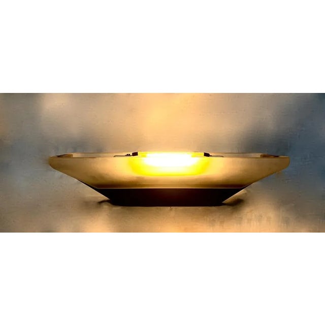 Couple of wall llights from the tronconi company. frack model. designi barbieri and marianelli. 1994. transparent glass...