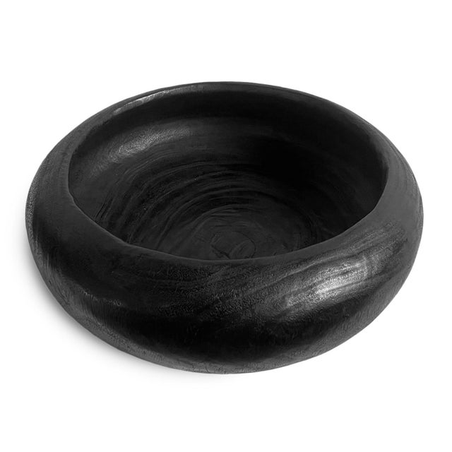 Vintage low profile solid hand carved wood bowl with handsome modern black smooth finish. Great used as a centerpiece and...