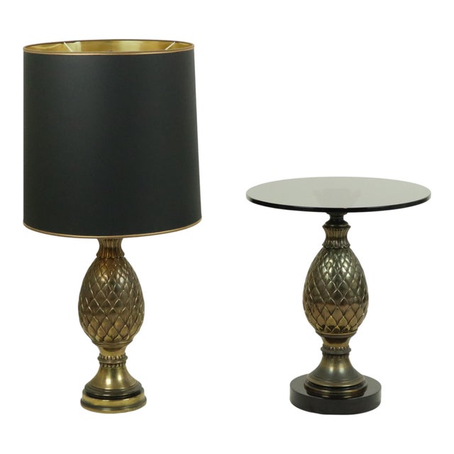 Fantastic and very rare set consisting of an XL pineapple lamp with a matching round pineapple table, made of brass,...