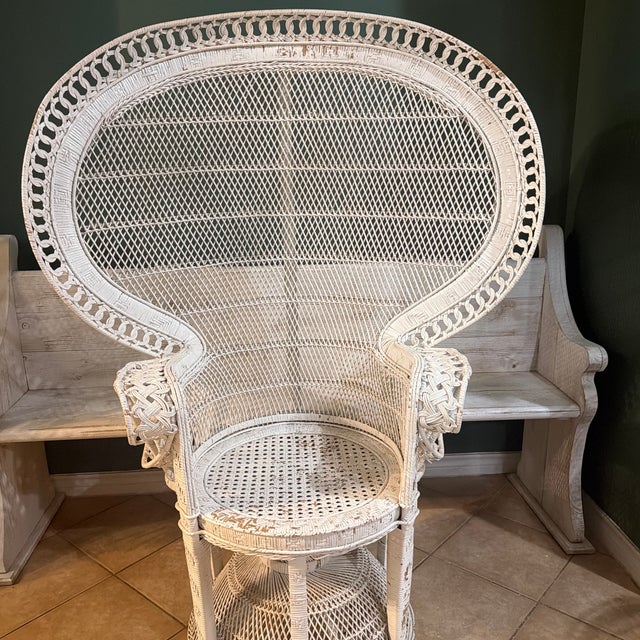 This Vintage Wicker 'Emmanuelle' Peacock Chair from the 1960s-1970s exudes a charming Mid-Century Modern style. Crafted...