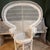 This Vintage Wicker 'Emmanuelle' Peacock Chair from the 1960s-1970s exudes a charming Mid-Century Modern style. Crafted...