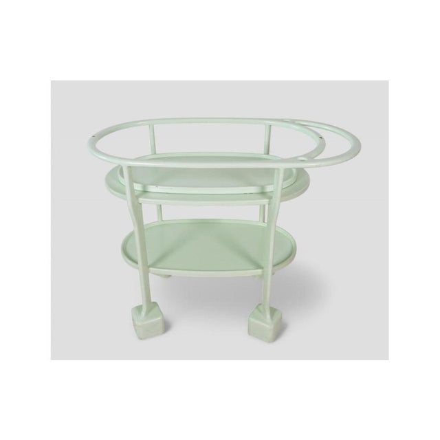 A refined example of Art Deco design, this 1930s serving trolley stands out for its sinuous lines and unique light green...