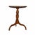 Antique candle table. Three legs support turned wood pedestal and top. The top has wear consistent with use and age...