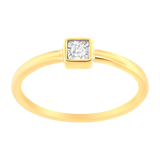 A classic look for the classic girl. Fashioned in stunning 14k yellow gold plated .925 sterling silver, this promise ring...
