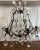 Early 20th Century French Louis XV Style Six Light Bronze or Brass Chandelier With Abundance of Cut Crystal Prisms For Sale - Image 9 of 12