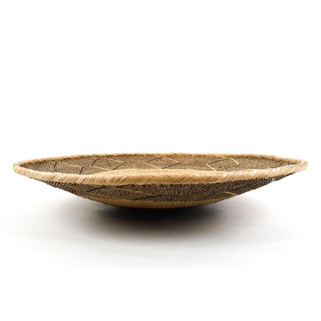 Tonga Binga baskets are traditional handcrafted baskets made by the Tonga women of Binga district in Zimbabwe. Crafted...
