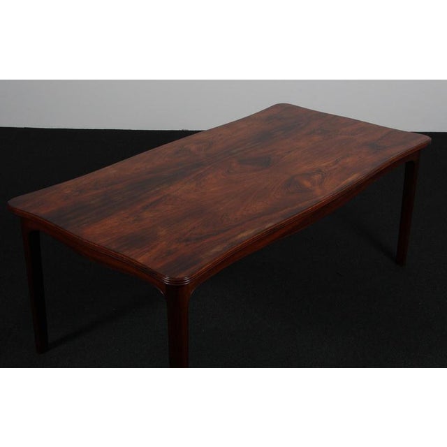 Frits Henningsen sofa table in rosewood. Made by Frits Henningsen in the 1950s. This piece is attributed to the mentioned...