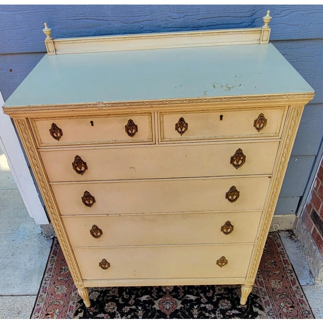A graceful nod to classical design, this rare find six-drawer dresser brings quiet elegance and storied charm to any...