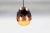This Danish pendant light is made of copper and black lacquered metal. It was designed by Werner Schou and produced by...