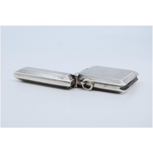 Guilloche Silver Matchbox with Edge Friezes and Hanging Ring, in Good conditions. Designed 1890 to 1919