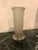 Gorgeous French Art Deco flower vase by Hettier and Vincent. Having clear and frosted molded glass floral motif. Held by...