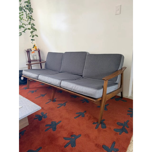 This 1950s Mexican Mid-Century Modern three-seat sofa was produced by Sillería La Malinche, a respected Mexican furniture...
