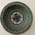 The product is a late 19th century Moroccan ceramic wall decor plate hand-painted with a glazed finish from Fez. This...