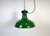 Industrial green enamel factory pendant light made in United Kingdom during the 1960s. White enamel inside the shade. Iron...