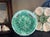 English majolica plate with a scalloped rim and begonia leaf in the center.
