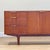 This elegant small sideboard, designed by Tom Robertson in the 1960s in Scotland , epitomizes the refined craftsmanship of...
