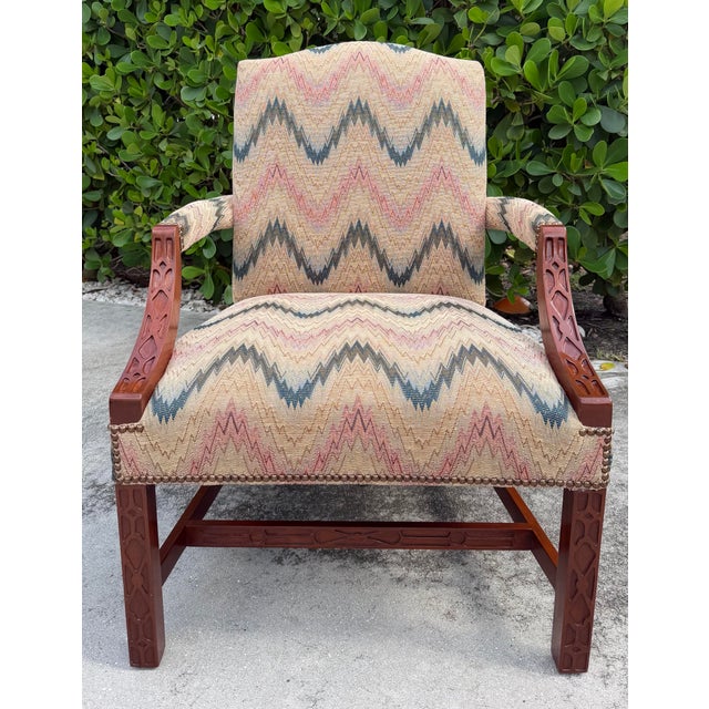 Striking vintage lounge chair featuring an expressive multicolor flamestitch upholstery in soft blue, green, blush, and...