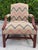 Striking vintage lounge chair featuring an expressive multicolor flamestitch upholstery in soft blue, green, blush, and...