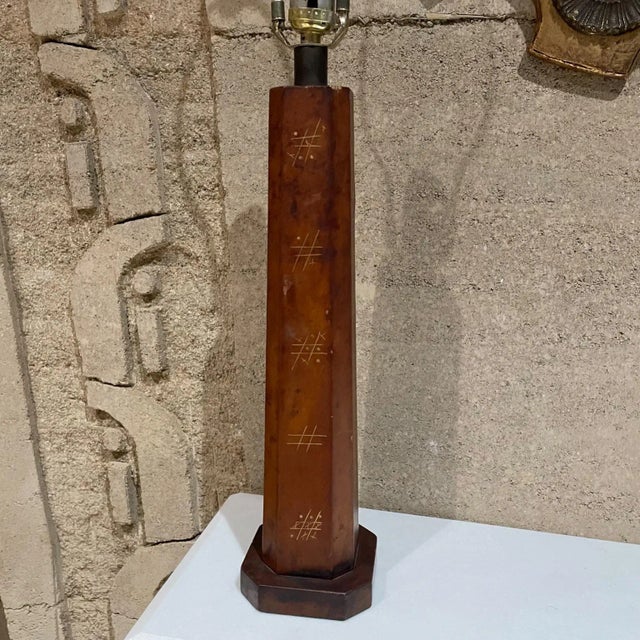 For your consideration, a leather wrapped table lamp hand painted in gold with "Tic Tac Toe" Decor. Attribution Arturo...