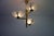 Rare italian brass and glass chandelier, 1950s. This elegant mid-century ceiling light features a refined brass structure...