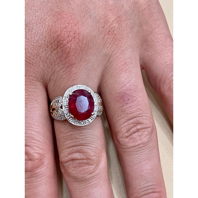Oval 7.5 Carat Treated Ruby and 1 Carat Diamond 14 Karat Yellow Gold Ring For Sale In New York - Image 6 of 18