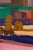 Christmas Decoration by Hiroshi Sato | Oil on Canvas Abstract scene with buildings and trees. For Sale - Image 4 of 5