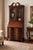 A refined 1930s–1940s American Colonial Revival secretary bookcase by Northwestern Furniture Co. of Burlington, Iowa....