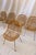 Designed by Gian Franco Legler in the 1960s, this set of six chairs combines an iron rod frame with a woven bamboo seat...