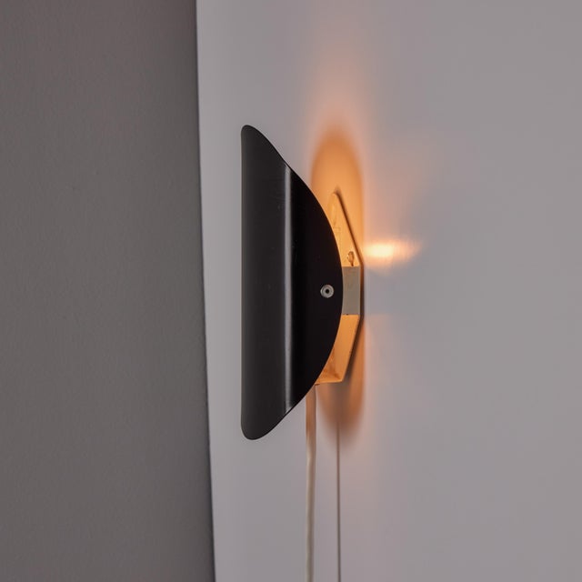 1960s Bent Karlby Model 23.3010 Black &amp; White Adjustable Plug-in Wall Lamp for Lyfa A delightful wall light executed...